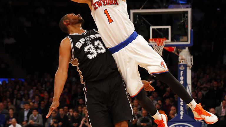 Alexey Shved of the New York Knicks draws a three-shot foul in overtime against Boris Diaw of the San Antonio Spurslooking forward to Opening Day