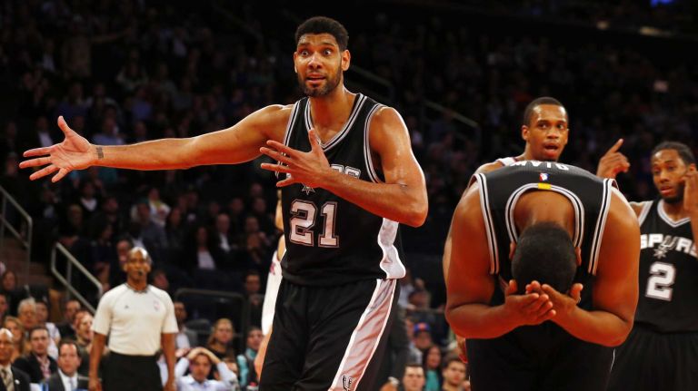 Tim Duncan and Boris Diaw of the San Antonio Spurs react after a call against the New York Knicks at Madison Square Garden on Tuesday, March 17, 2015.