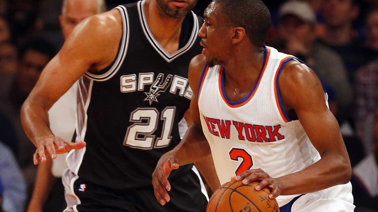 Langston Galloway of the New York Knicks controls the ball in the first half against Tim Duncan of the San Antonio Spurs at Madison Square Garden on Tuesday, March 17, 2015.