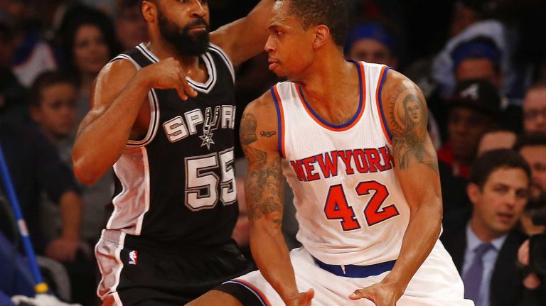 Lance Thomas of the New York Knicks looks to drive to the basket in the first half against Reggie Williams of the San Antonio Spurs at Madison Square Garden on Tuesday, March 17, 2015.