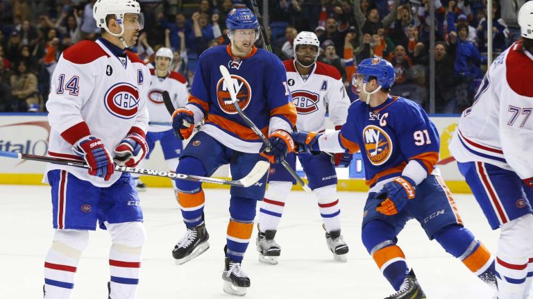 Josh Bailey of the New York Islanders celebrates his third-period goal against the Montreal Canadiens with teammate John Tavares at Nassau Coliseum on Saturday, March 14, 2015 in Uniondale.