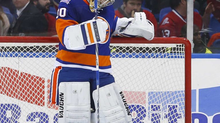 Michal Neuvirth of the New York Islanders looks on late in a game against the Montreal Canadiens at Nassau Coliseum on Saturday, March 14, 2015.