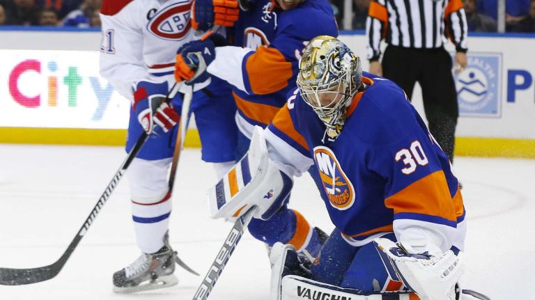 Michal Neuvirt of the New York Islanders makes a save in the second period against the Montreal Canadiens at Nassau Coliseum on Saturday, March 14, 2015 in Uniondale.