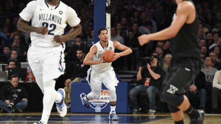 Villanova Wildcats guard Josh Hart passes the ball after he rebounds against the Xavier Musketeers during the final game of the Big East basketball tournament at Madison Square Garden on Saturday, March 14, 2015.