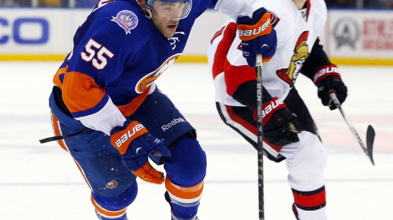 Johnny Boychuk of the New York Islanders skates against the Ottawa Senators at Nassau Coliseum on Friday, March 13, 2015.