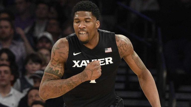 Big East Tournament semifinal: Georgetown vs. Xavier 50 Xavier Musketeers forward Jalen Reynolds reacts after he scores against the Georgetown Hoyas in a Big East semifinal men's basketball game at Madison Square Garden on Friday, March 13, 2015.