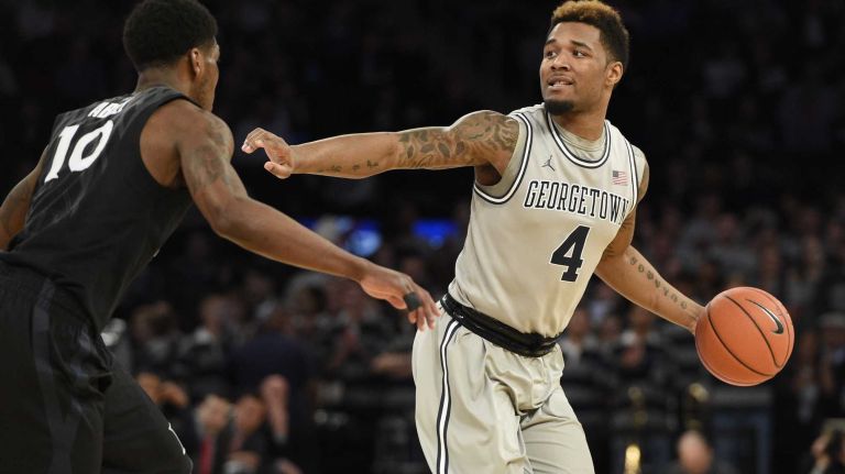 Big East Tournament semifinal: Georgetown vs. Xavier 53 Georgetown Hoyas guard D'Vauntes Smith-Rivera is defended by Xavier Musketeers guard Remy Abell in a Big East semifinal men's basketball game at Madison Square Garden on Friday, March 13, 2015.
