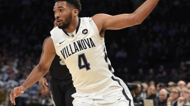 Villanova Wildcats guard Darrun Hilliard II drives to the baseline against the Providence Friars in a Big East semifinal men's basketball game at Madison Square Garden on Friday, March 13, 2015.