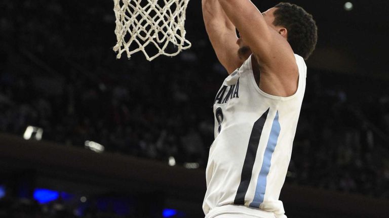 Villanova Wildcats guard Josh Hart dunks against the Providence Friars in a Big East semifinal men's basketball game at Madison Square Garden on Friday, March 13, 2015.