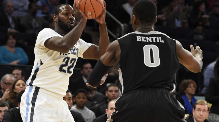 Villanova Wildcats forward JayVaughn Pinkston looks to pass against Providence Friars forward Ben Bentil in a Big East semifinal men's basketball game at Madison Square Garden on Friday, March 13, 2015.