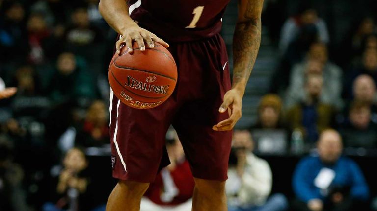 NEW YORK, NY - MARCH 12: Mandell Thomas #1 of the Fordham Rams dribbles the ball against Virginia Commonwealth Rams during the Second Round of the Atlantic 10 Basketball Tournament at Barclays Center on March 12, 2015 in New York, New York. Virginia Commonwealth Rams defeated the Fordham Rams 63-57. (Photo by Mike Stobe/Getty Images)