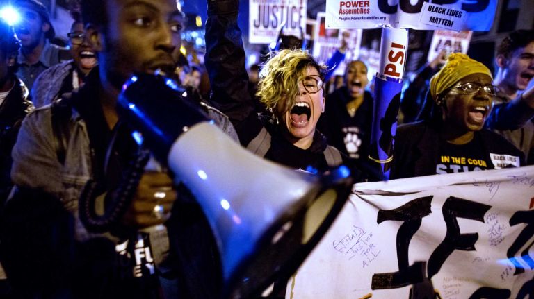 Protesters react in Manhattan Monday, Nov. 24, 2014, after a grand jury declined to indict Ferguson, Missouri, Officer Darren Wilson, who shot and killed an unarmed Michael Brown in August. 