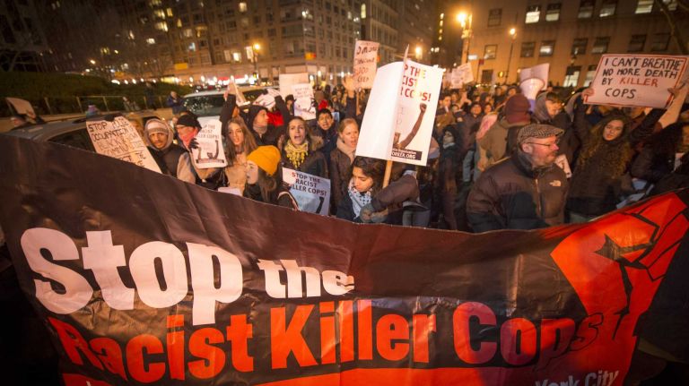 The demonstrator, with their bold signs leaving Foley Square in New York City march into Brookliyn Dec. 4, 2014 for the death of Eric Garner, the man police choked to death while trying to make an arrest for allegedly selling cigarettes sparked demonstration all over the country.