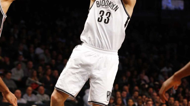 Mirza Teletovic of the Brooklyn Nets puts up a shot in the second half against the San Antonio Spurs during an NBA game at Barclays Center on Wednesday, Dec. 3, 2014.