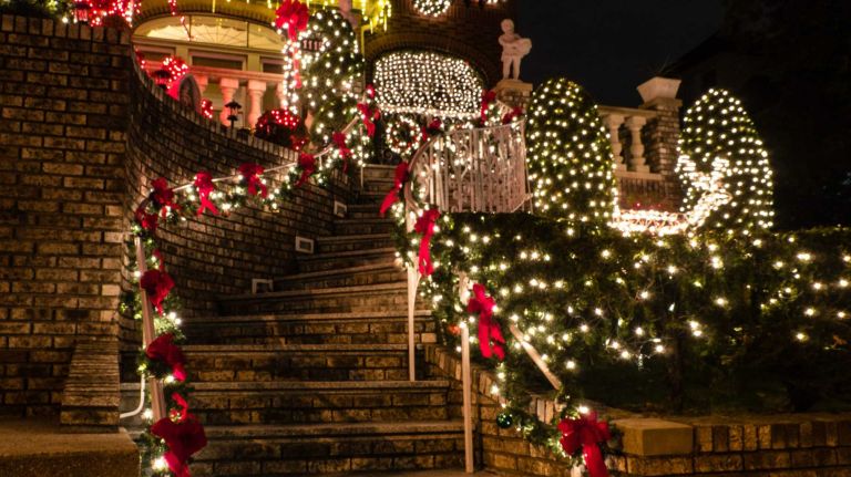The stairway to a home on 84th Street sparkles with Christmas lights in Brooklyn's Dyker Heights.