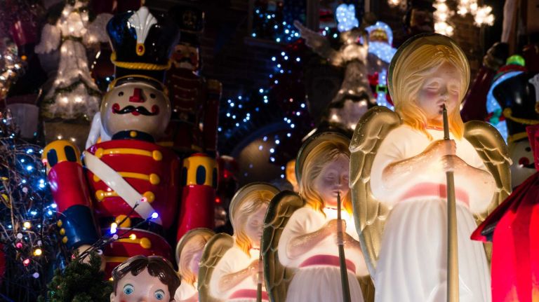 Angels and nutcrackers are part of a Christmas lights display on 84th street in Dyker Heights, Brooklyn.