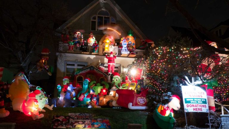 A mixture of inflatable Christmas and cartoon displays are the theme for this house on Twelfth Avenue in Brooklyn's Dyker Heights.