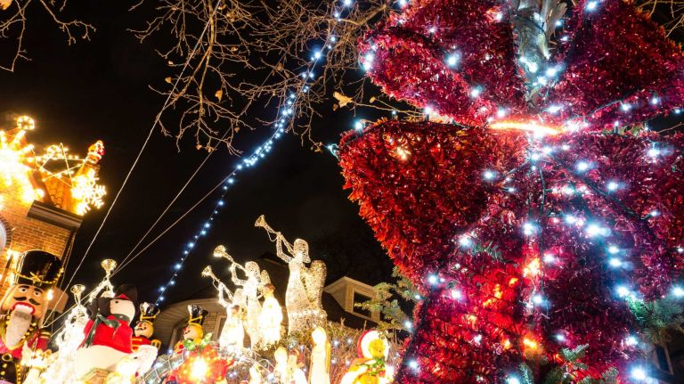 Glittering angels blow their trumpets in a Christmas lights display on 84th street in Dyker Heights, Brooklyn, Dec. 4, 2014.