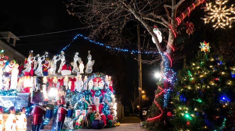 Angels, nutcracker soldiers and Santa complete the Christmas lights display on 84th street in Dyker Heights, Brooklyn, Dec. 4, 2014.