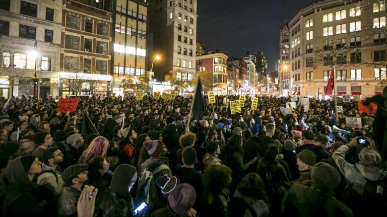 Protesters gather in Lower Manhattan on Tuesday, Nov. 25, 2014, in response to the grand jury decision regarding the fatal shooting of Michael Brown in Ferguson, Mo.