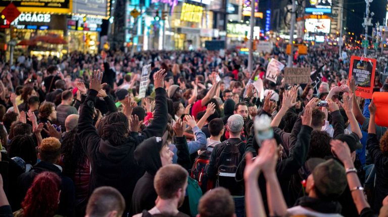 Protesters react in Manhattan on Monday, Nov. 24, 2014, after a grand jury decision declined to indict Ferguson Officer Darren Wilson, who shot and killed an unarmed Michael Brown in August, sparking violent protests in Ferguson, Mo.