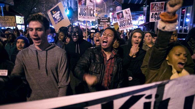 Protesters gather in Manhattan Monday, Nov. 24, 2014, following the grand jury's decision not to indict Ferguson, Mo., police Officer Darren Wilson. Wilson shot and killed an unarmed Michael Brown in August.