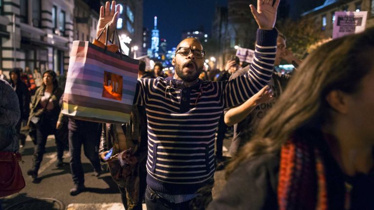 Protesters gather in Manhattan Monday, Nov. 24, 2014, after the grand jury's decision was made public: They declined to indict Ferguson police Officer Darren Wilson who shot and killed Michael Brown in August.