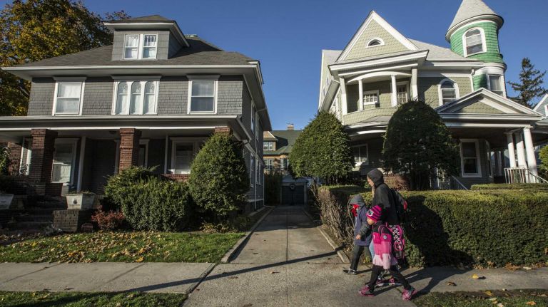 Flatbush photos 10 People walk along Beverley Road in Flatbush in Brooklyn on November 14, 2014.