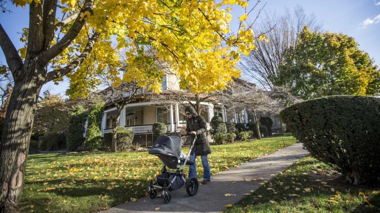 Flatbush photos 11 A woman walk along Rugby Road in Flatbush in Brooklyn on Nov.14, 2014.