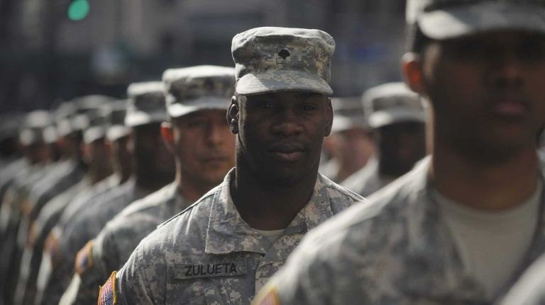 NYC Veterans Day Parade in images 12 Soldiers march in the 95th annual New York City Veterans Day Parade on Tuesday, November 11, 2014.