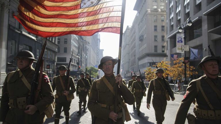NYC Veterans Day Parade in images 13 Participants march in the 95th annual New York City Veterans Day Parade on Tuesday, November 11, 2014.