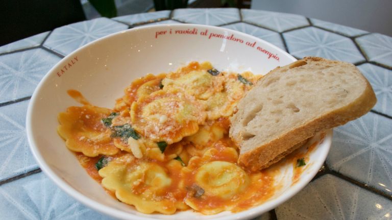 Behind Eataly NYC Downtown's new ravioli takeout counter 1 A dish of spinach and ricotta ravioli prepared at Eataly NYC Downtown's new ravioli takeout counter