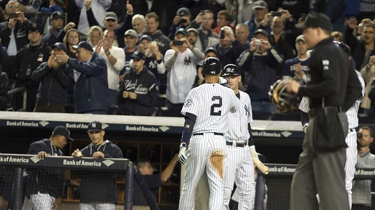Derek Jeter's final game at Yankee Stadium 149 Yankees' Derek Jeter is greeted at the dugout after scoring a run in the first inning against the Baltimore Orioles at Yankee Stadium on Thursday, Sept. 25, 2014.