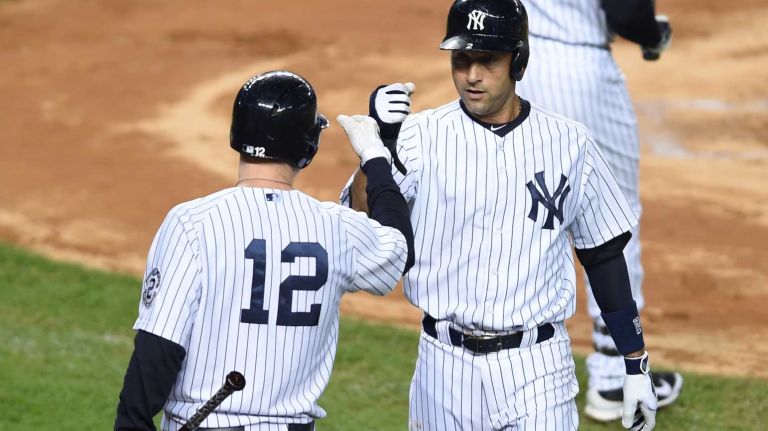 Derek Jeter's final game at Yankee Stadium 158 Yankees' Derek Jeter is congratulated by Chase Headley after scoring on an RBI single in the first inning of his his final game at Yankee Stadium against the Baltimore Orioles on Sept. 25, 2014.