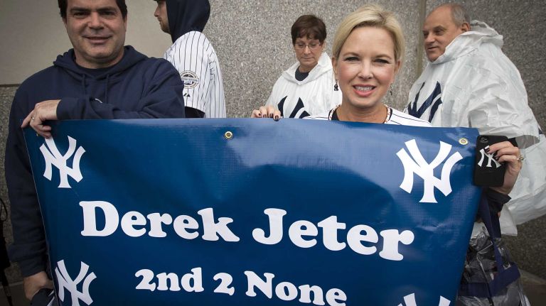 Derek Jeter's final game at Yankee Stadium 172 Gary and Pam Cirilli of Jackson, Miss. show off their homemade sign before entering the stadium for Derek Jeter's final home game against the Baltimore Orioles at Yankee Stadium on Sept. 25, 2014.