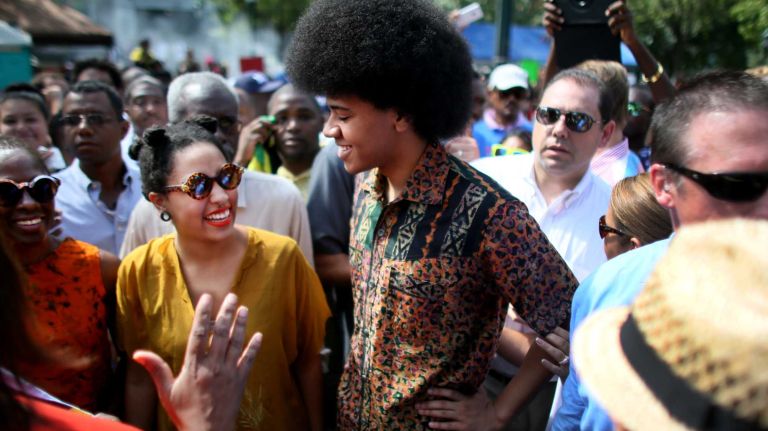 New York Mayor Bill de Blasio's wife and children, Chirlane McCray, Chiara de Blasio and Dante de Blasio, prepare to march in the West Indian Day Parade on Monday, Sept. 1, 2014.