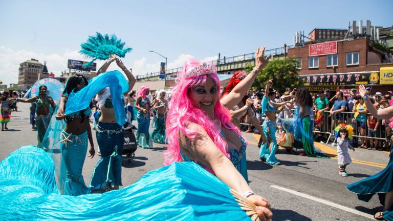 The Coney Island Mermaid Parade recently received a $20,000 donation from Meyer Orbach, chair of the Orbach Group. Above, a sea of blue is seen along Surf Avenue during the annual parade on June 18, 2016.