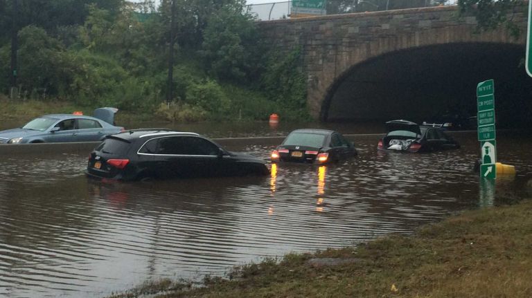 Northern State Parkway is flooded near Route 107 Wednesday morning, Aug. 13, 2014.