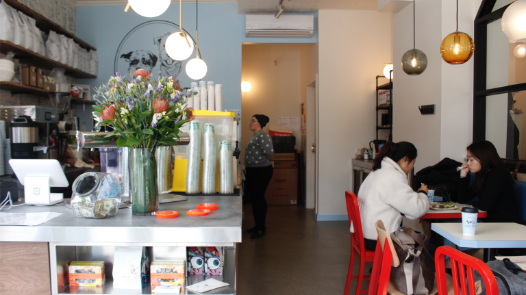 On the cafe side of the shop, you can order coffee drinks, cheese plates and avocado toast.