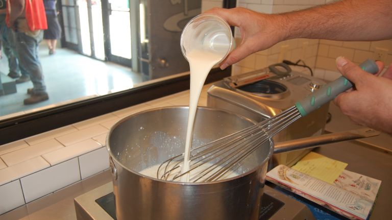 Add 1 2/3 cups heavy cream to the mixture. 