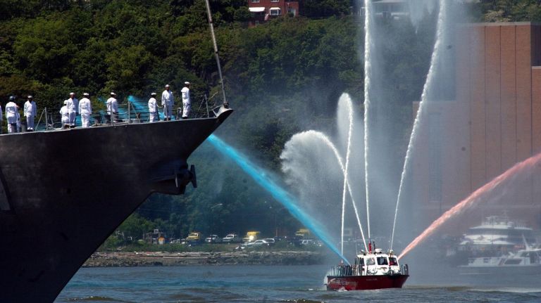 A Coast Guard boat sprays water as Fleet Week begins in NYC on May 22, 2002.