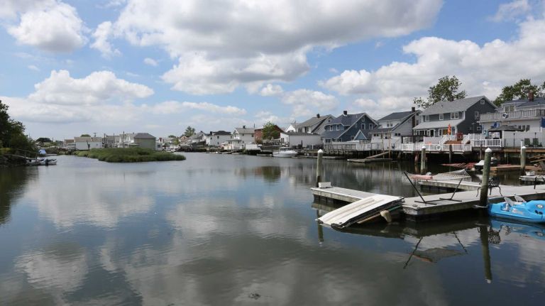 Houses along the Hawtree Basin in Howard Beach, Queens, Friday June 27, 2014.