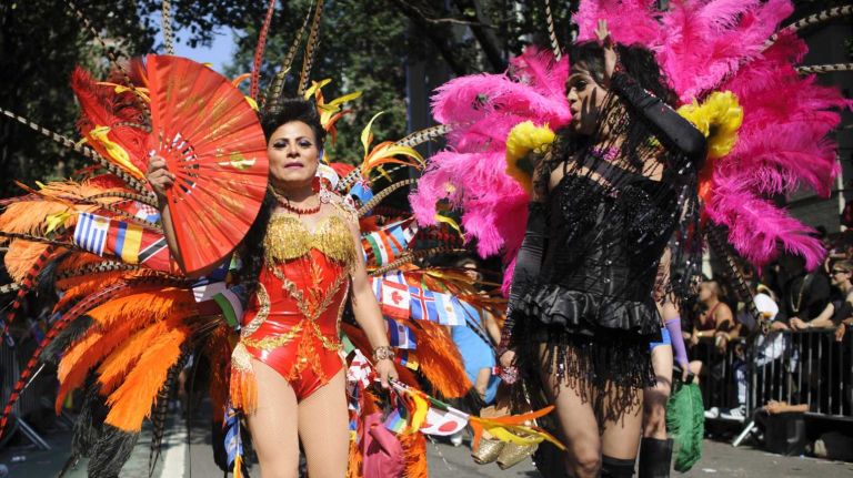 Participants walk in the New York City Pride Parade in Manhattan on Sunday, June 29, 2014.