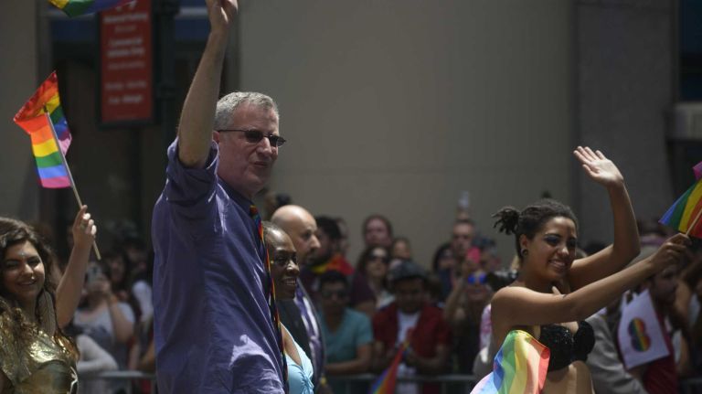 New York Mayor Bill de Blasio walks during the pride parade in Manhattan on Sunday, June 29, 2014.
