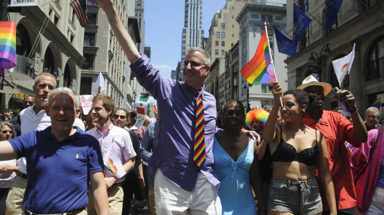 Mayor Bill de Blasio walks during the New York City pride parade in Manhattan on Sunday, June 29, 2014.