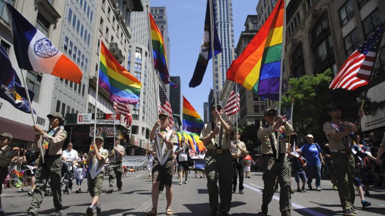 Participants walk during the New York City pride parade in Manhattan on Sunday, June 29, 2014.