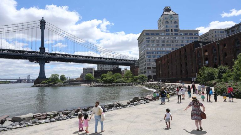 Brooklyn Bridge Park with the Manhattan Bridge in the background in Dumbo on Friday, June 6, 2014.