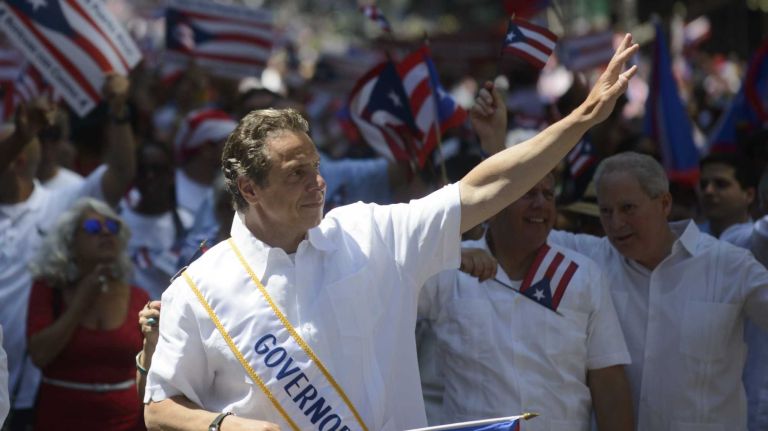 Gov. Andrew M. Cuomo marches in the 57th annual National Puerto Rican Day Parade in Manhattan on Sunday, June 8, 2014.