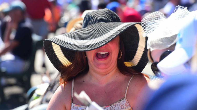 Horse racing enthusiasts at Belmont Park in Elmont on Saturday, June 7, 2014. The Belmont Stakes is the third and final leg of the triple crown of horse raising. This year's race marks the 146th running of the stakes where California Chrome will attempt to become racing's 12th Triple Crown winner.