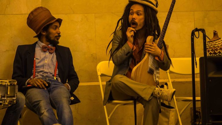 Two members of the Brown Rice Family waiting to go on at the 27th annual auditions for Music Under New York in Grand Central Terminal's Vanderbilt Hall. 